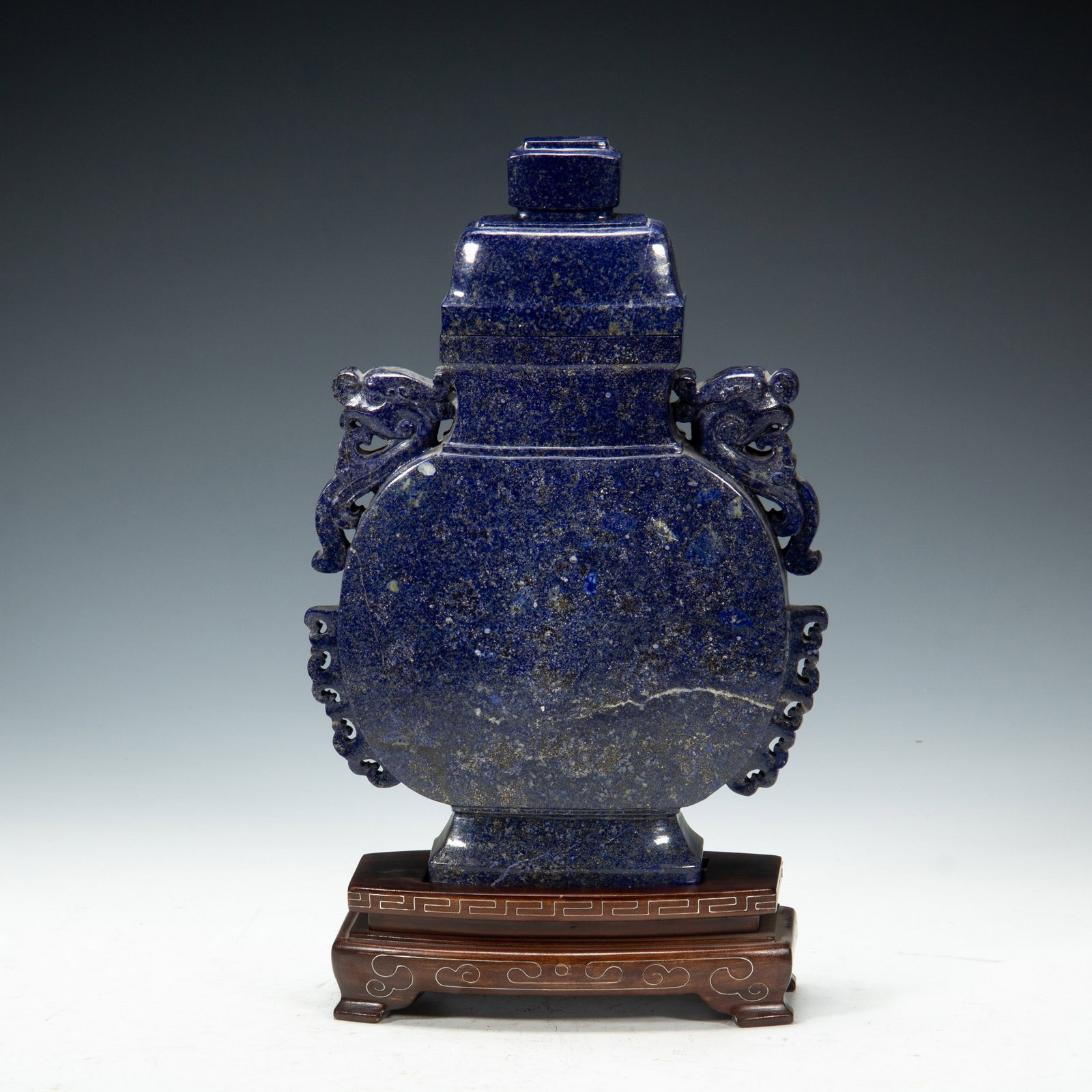 A LAPIS LAZULI BOTTLE: 清 青金石瓶 A lapis lazuli bottle Ht.34cm