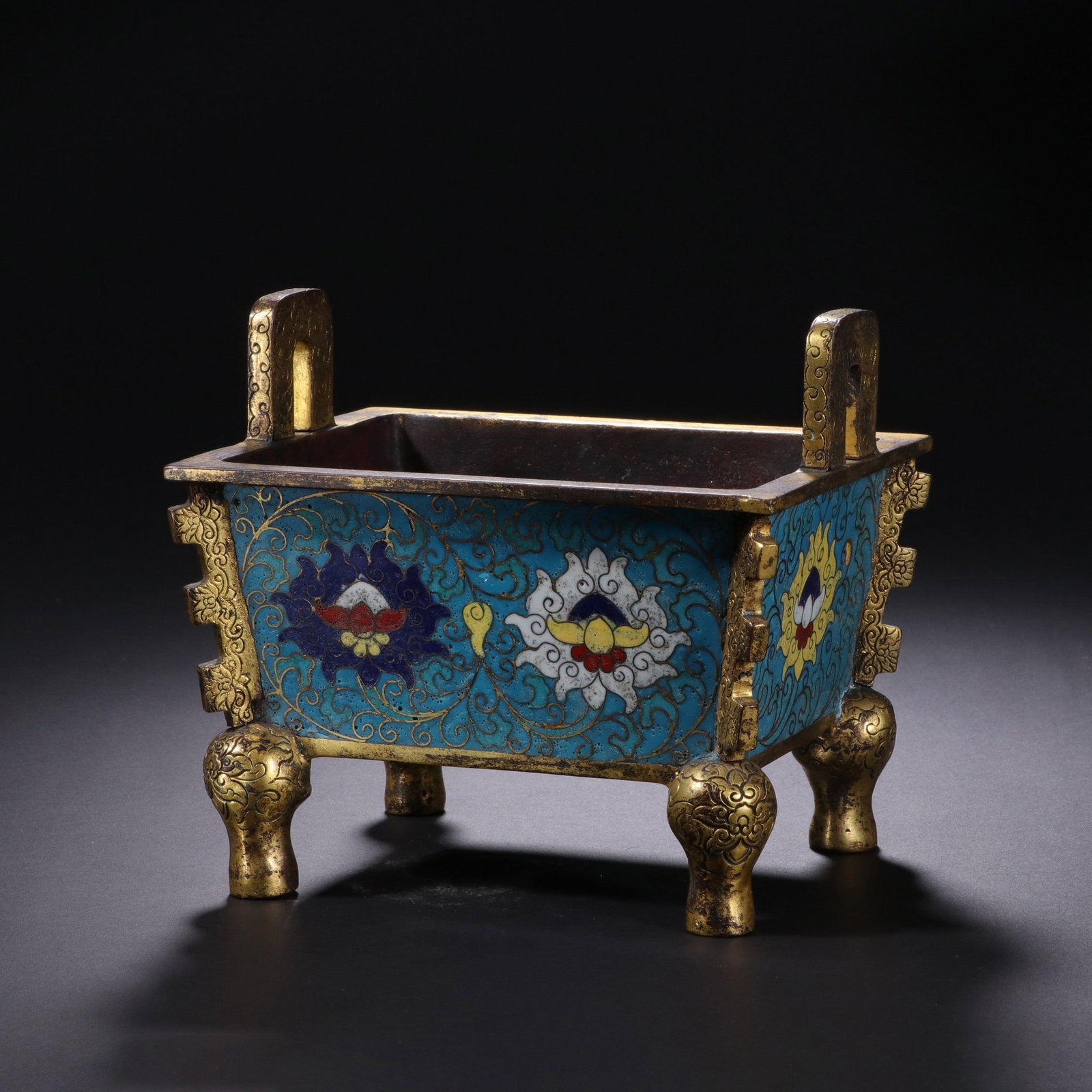A COPPER GILDED CLOISONNE ? STOVE WITH WIRE CUTTING: 清 铜鎏金掐丝景泰蓝炉 A copper gilded cloisonne é stove with wire cutting Ht.12.2cm