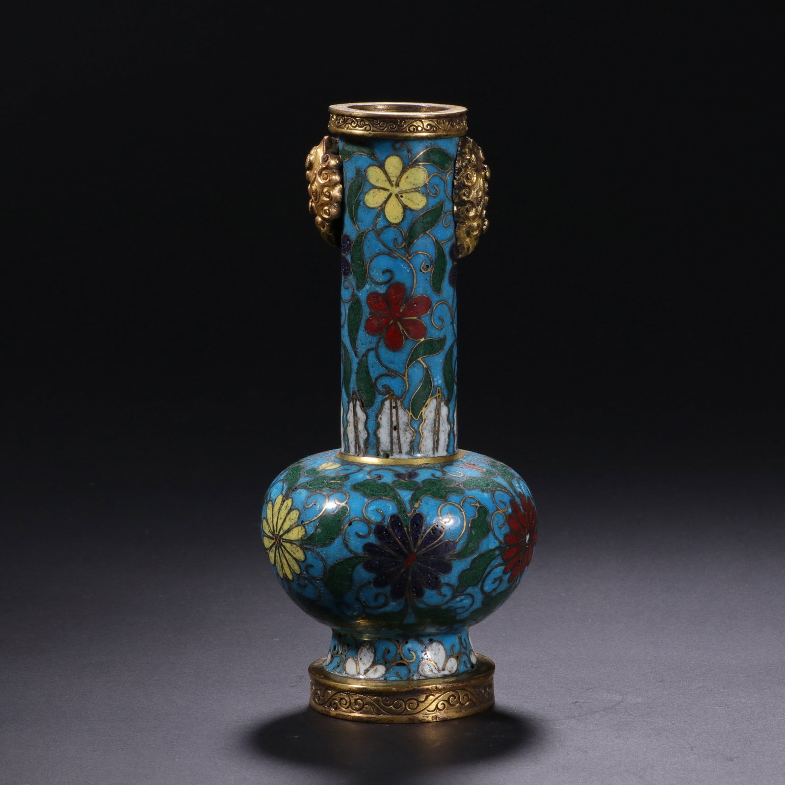 A COPPER GILDED CLOISONNE ? VASE WITH CLOISONNE ? WIRE: 清 铜鎏金掐丝景泰蓝瓶 A copper gilded cloisonne é vase with cloisonne é wire Ht.14.5cm