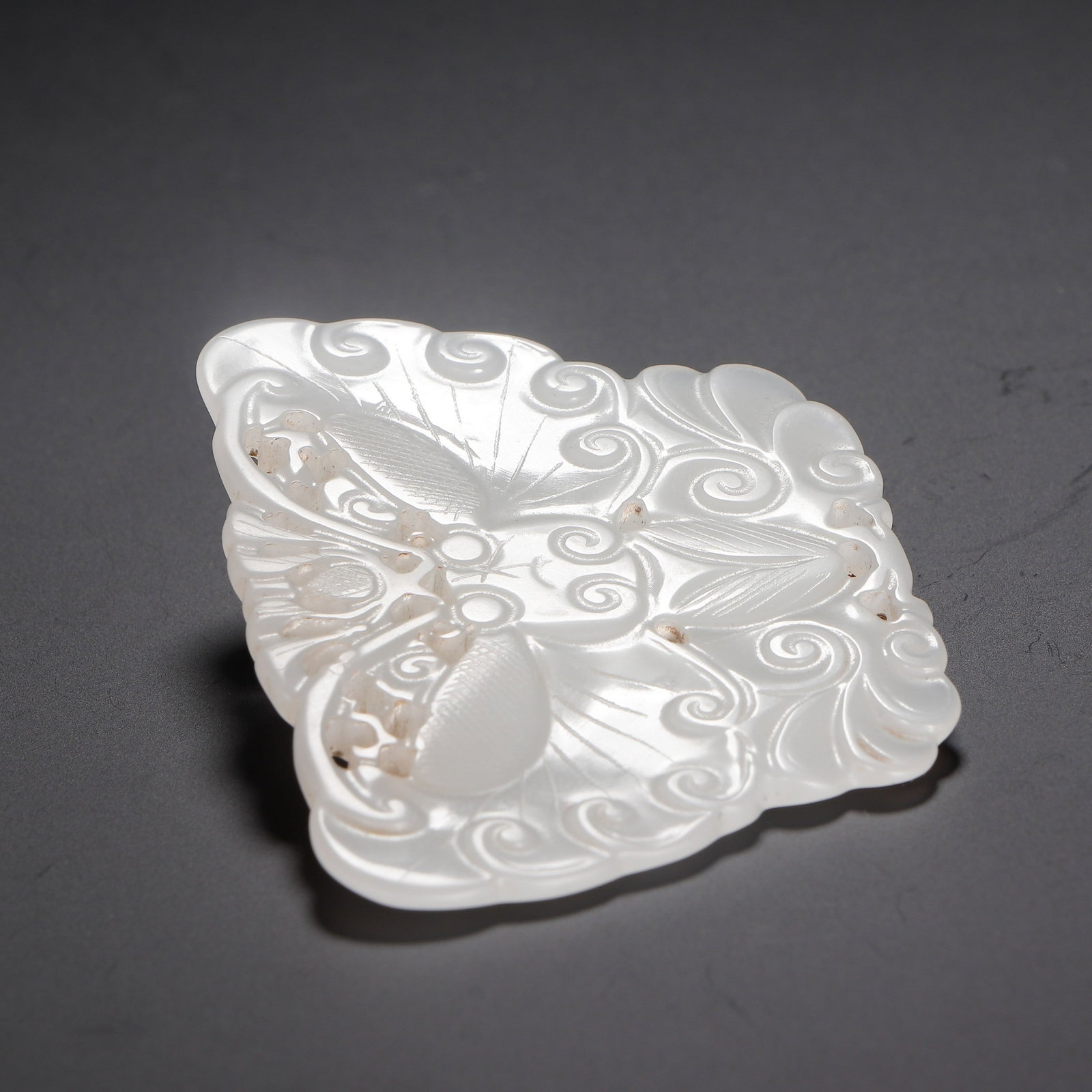 A JADE ORNAMENT - 9