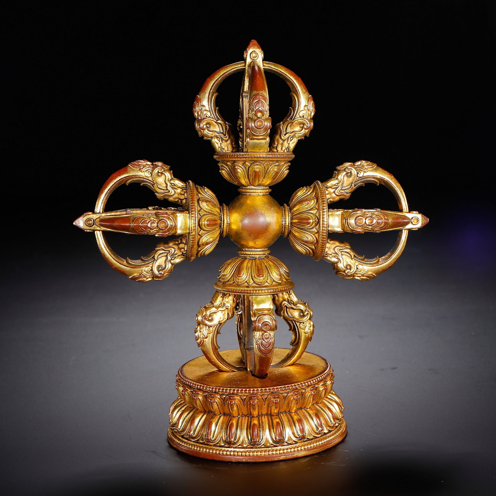A COPPER GILDING RITUAL IMPLEMENT: 清 铜鎏金法器 A copper gilding ritual implement Ht.15cm