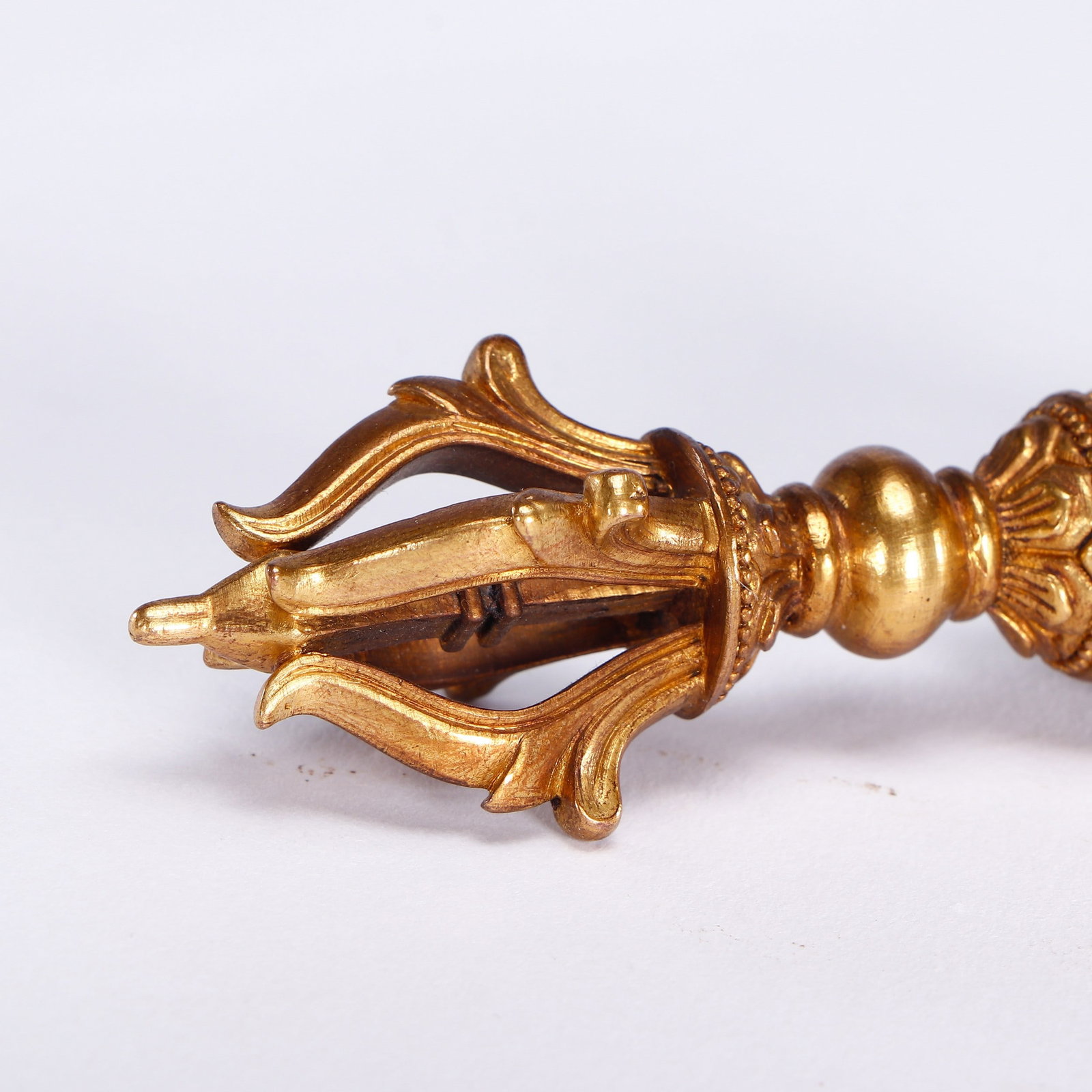 A COPPER GILDING RITUAL IMPLEMENT - 2