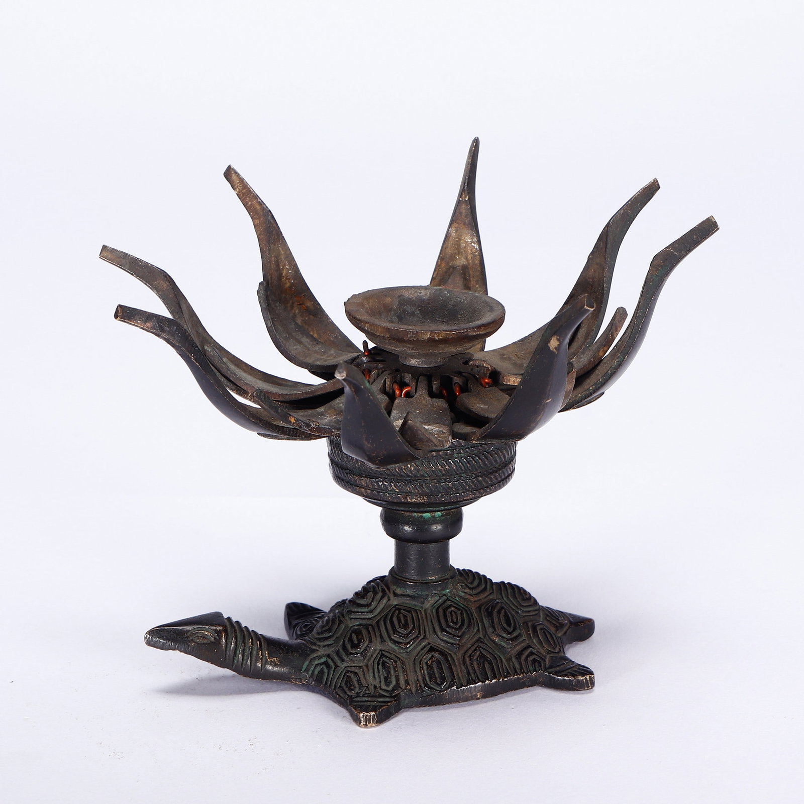 A COPPER CANDLE HOLDER - 7
