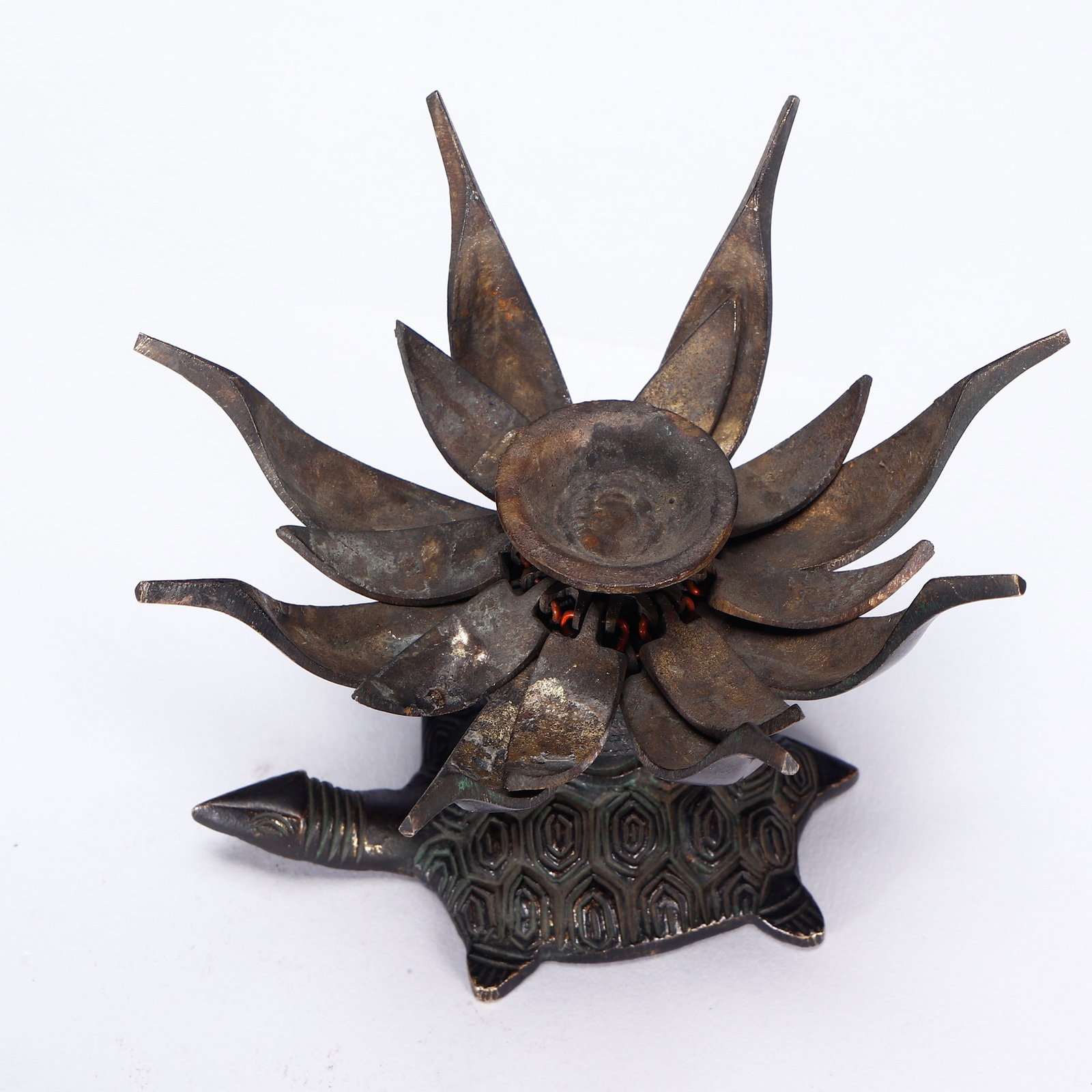 A COPPER CANDLE HOLDER - 8