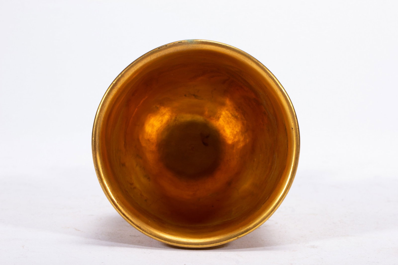 A COPPER GILDING CUP - 9