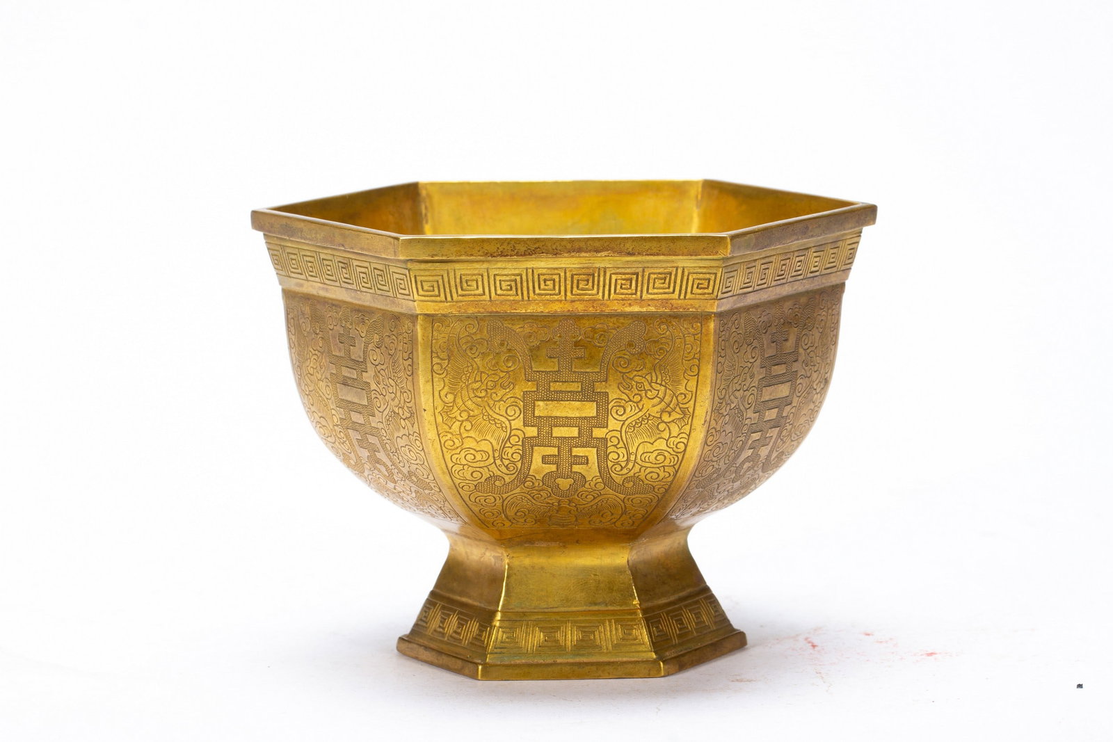 A COPPER GILDING BOWL: 清 铜鎏金碗 A copper gilding bowl Lg.12cm