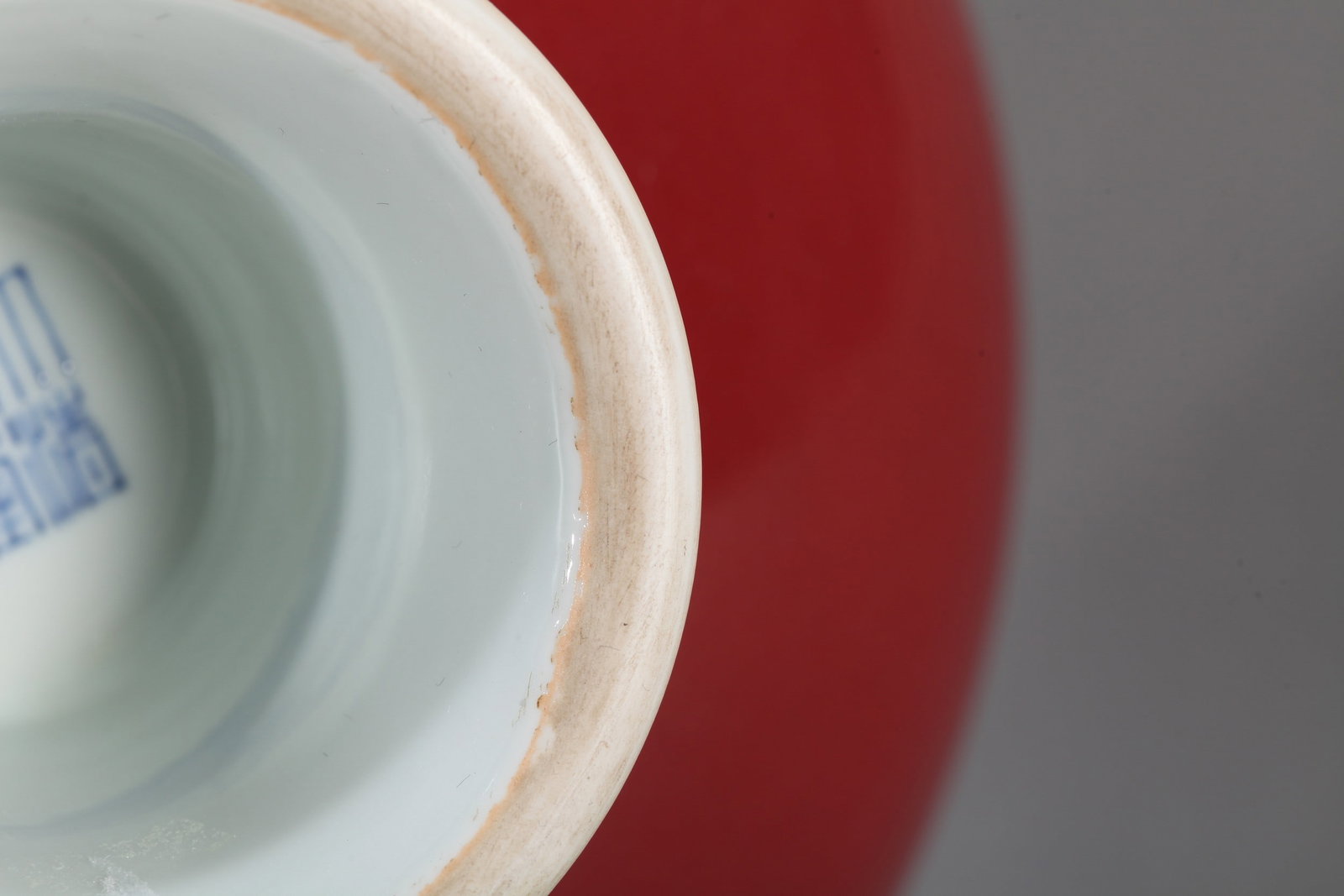 A RED-GLAZED STEM DISH - 8