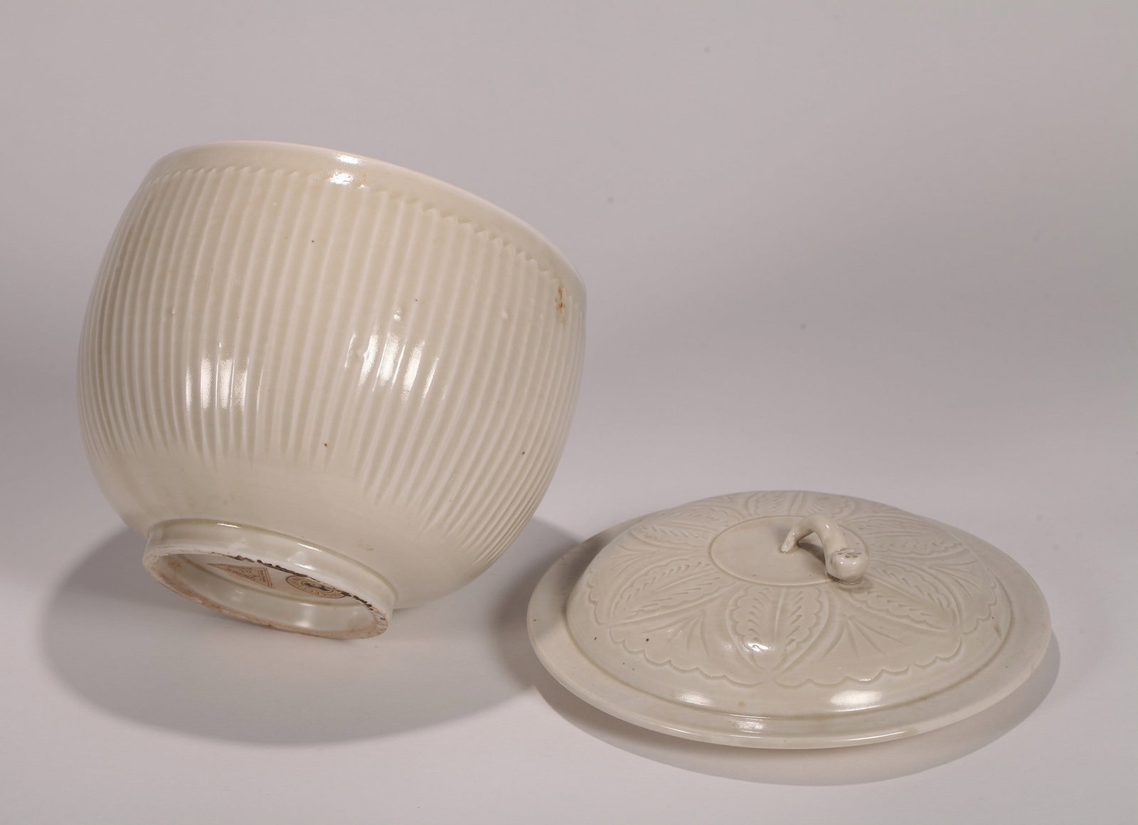 A DING COVERED JAR - 5