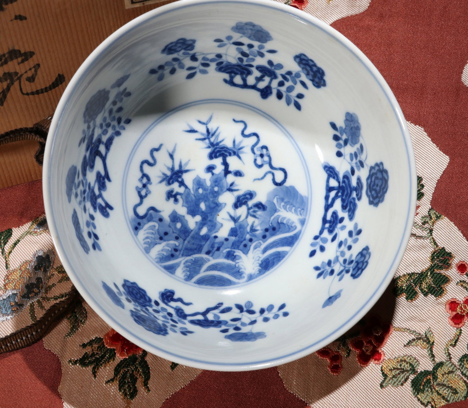 A RUBY-GROUND FLORAL BOWL - 3