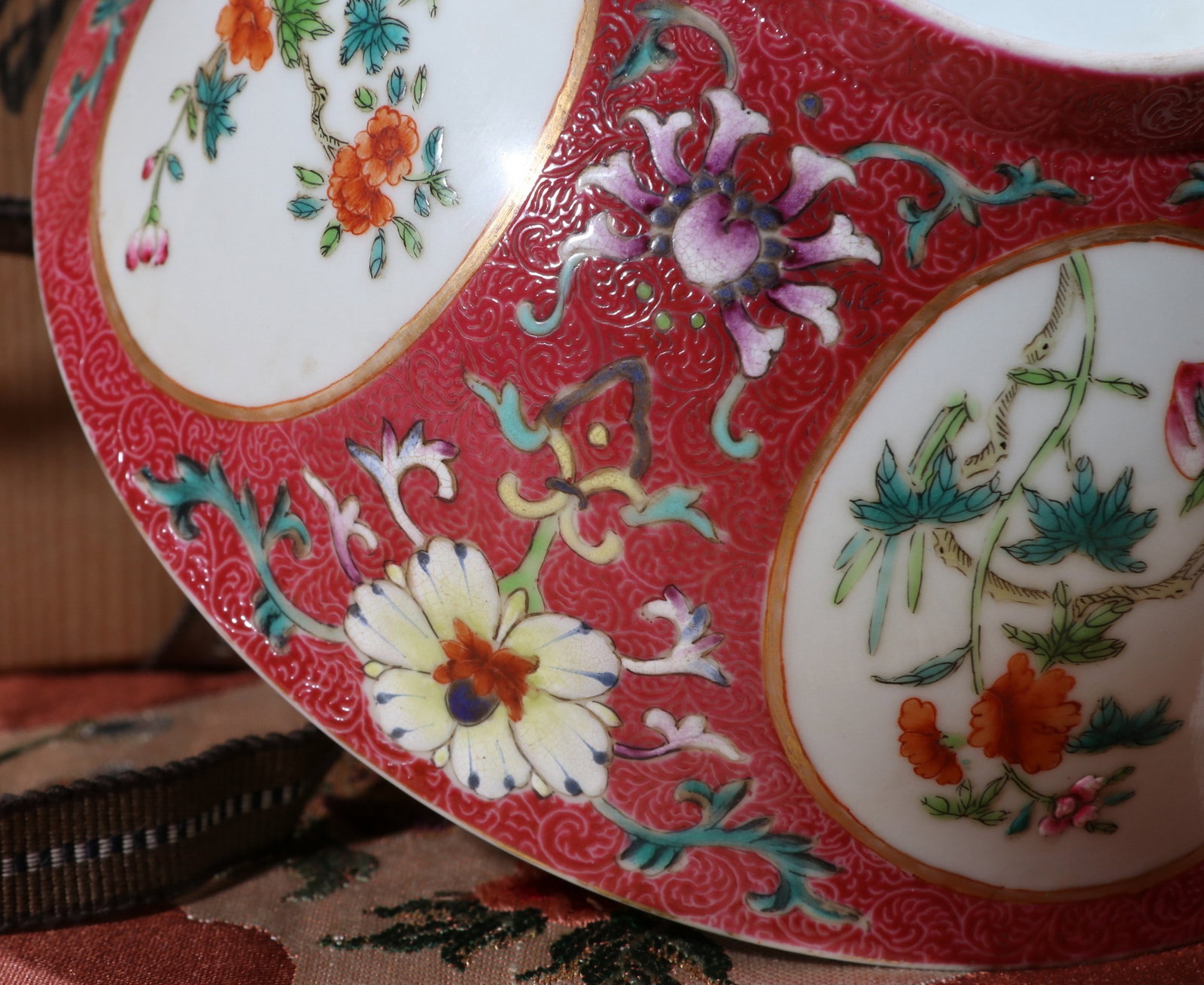 A RUBY-GROUND FLORAL BOWL - 6
