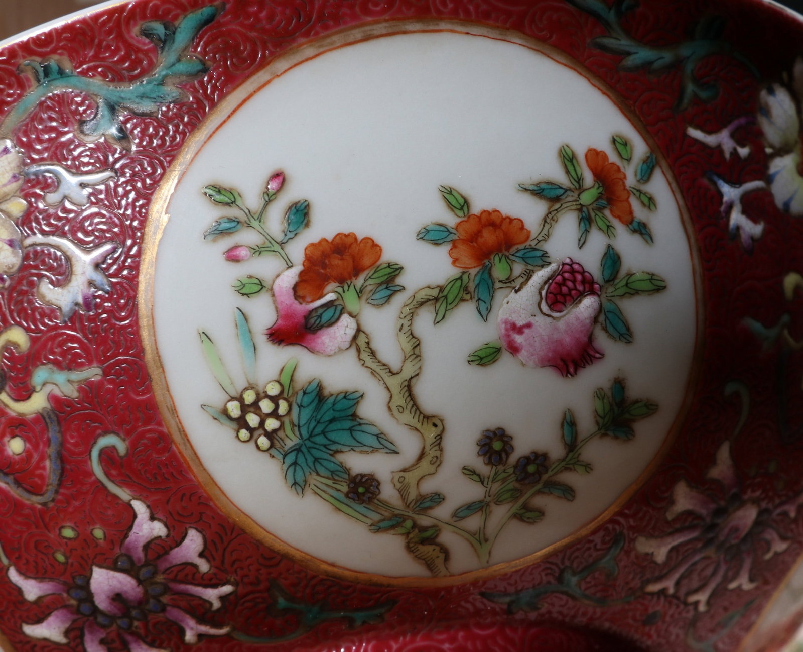 A RUBY-GROUND FLORAL BOWL - 8