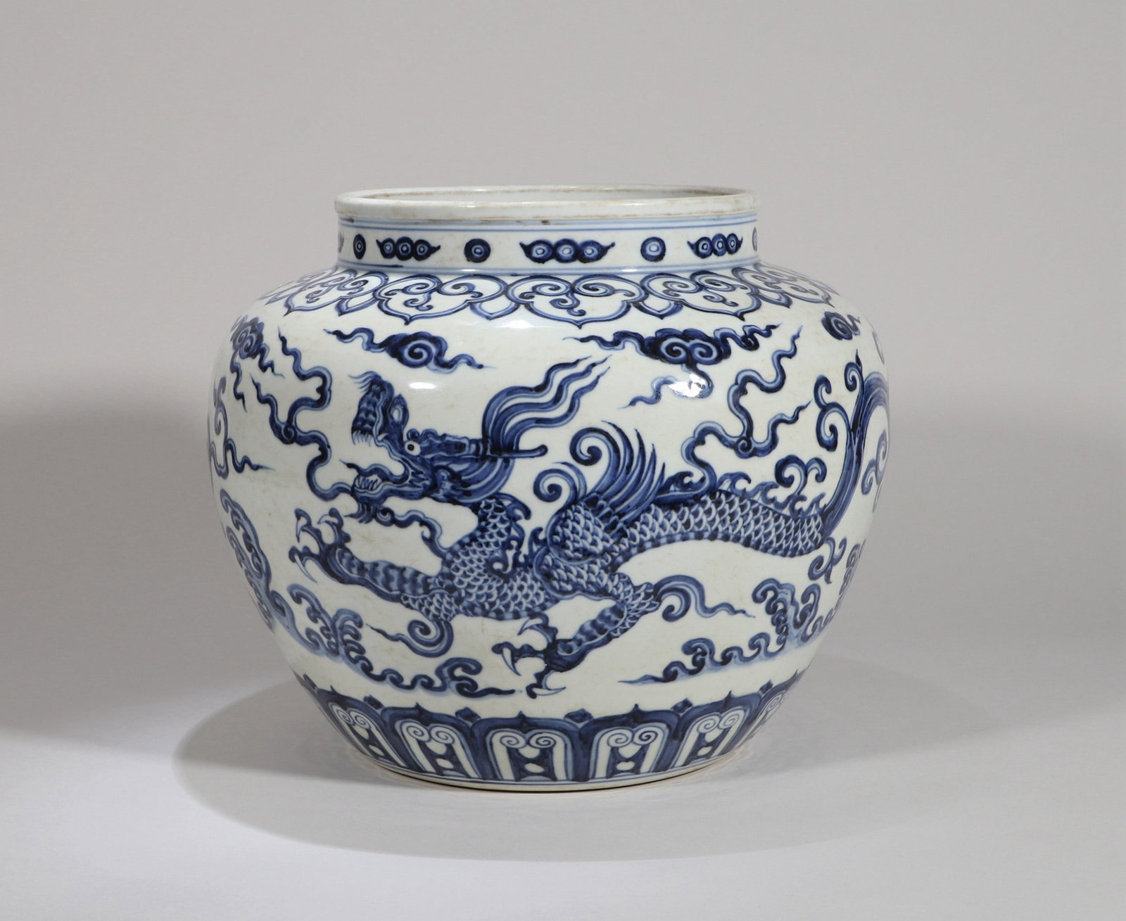 A LARGE BLUE AND WHITE DRAGON JAR (1 of 13)