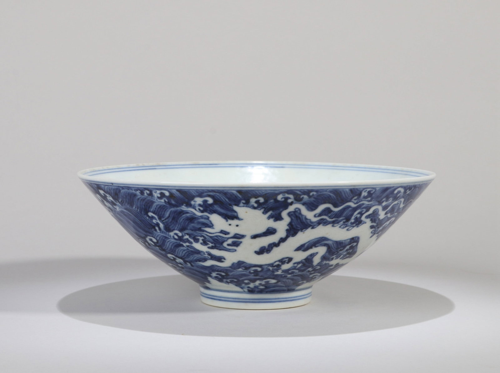 A LARGE BLUE AND WHITE 'SANSKRIT' BOWL: 明宣德 青花梵文大斗笠碗 A large blue and white 'Sanskrit' bowl Diam.22.5cm Ht.8cm