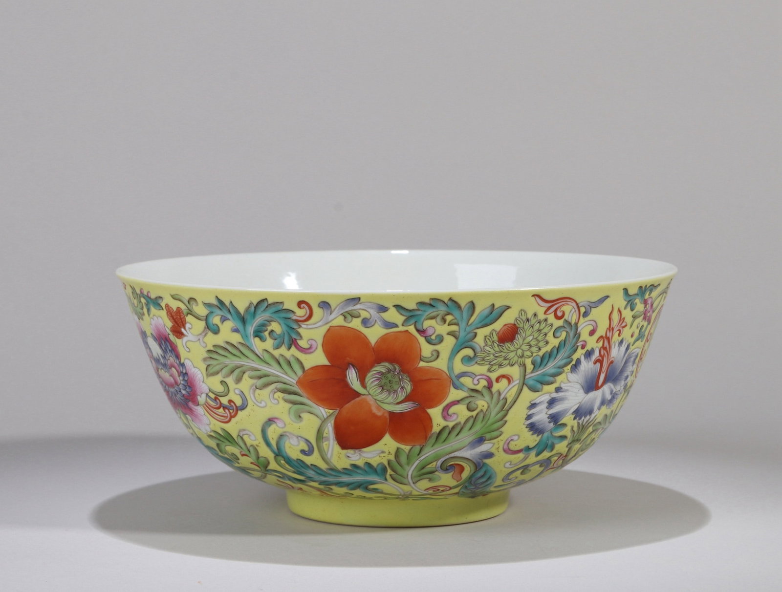 A YELLOW-GROUND FAMILLE-ROSE FLORAL BOWL (1 of 7)