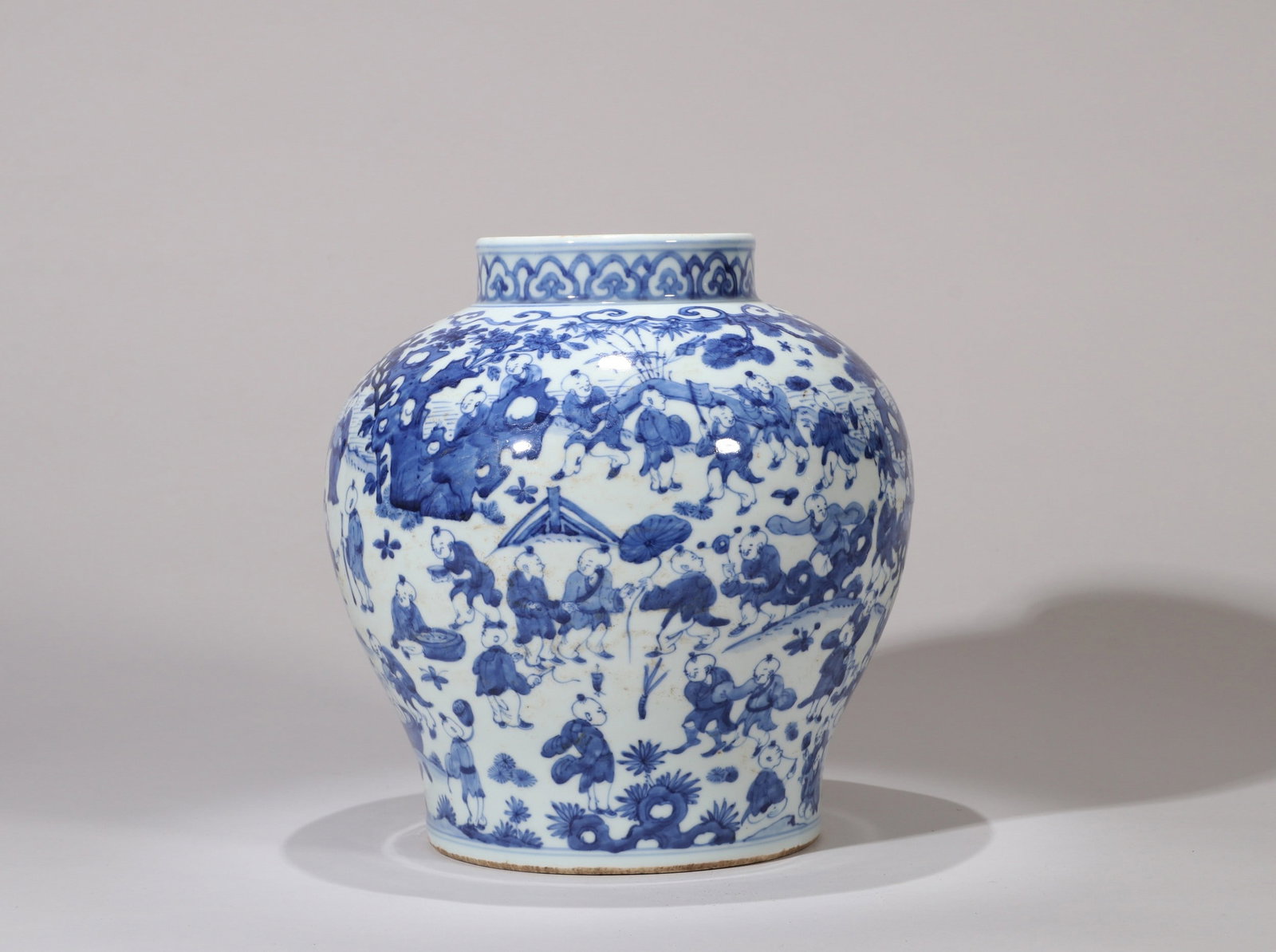A BLUE AND WHITE CHILDREN JAR (1 of 10)