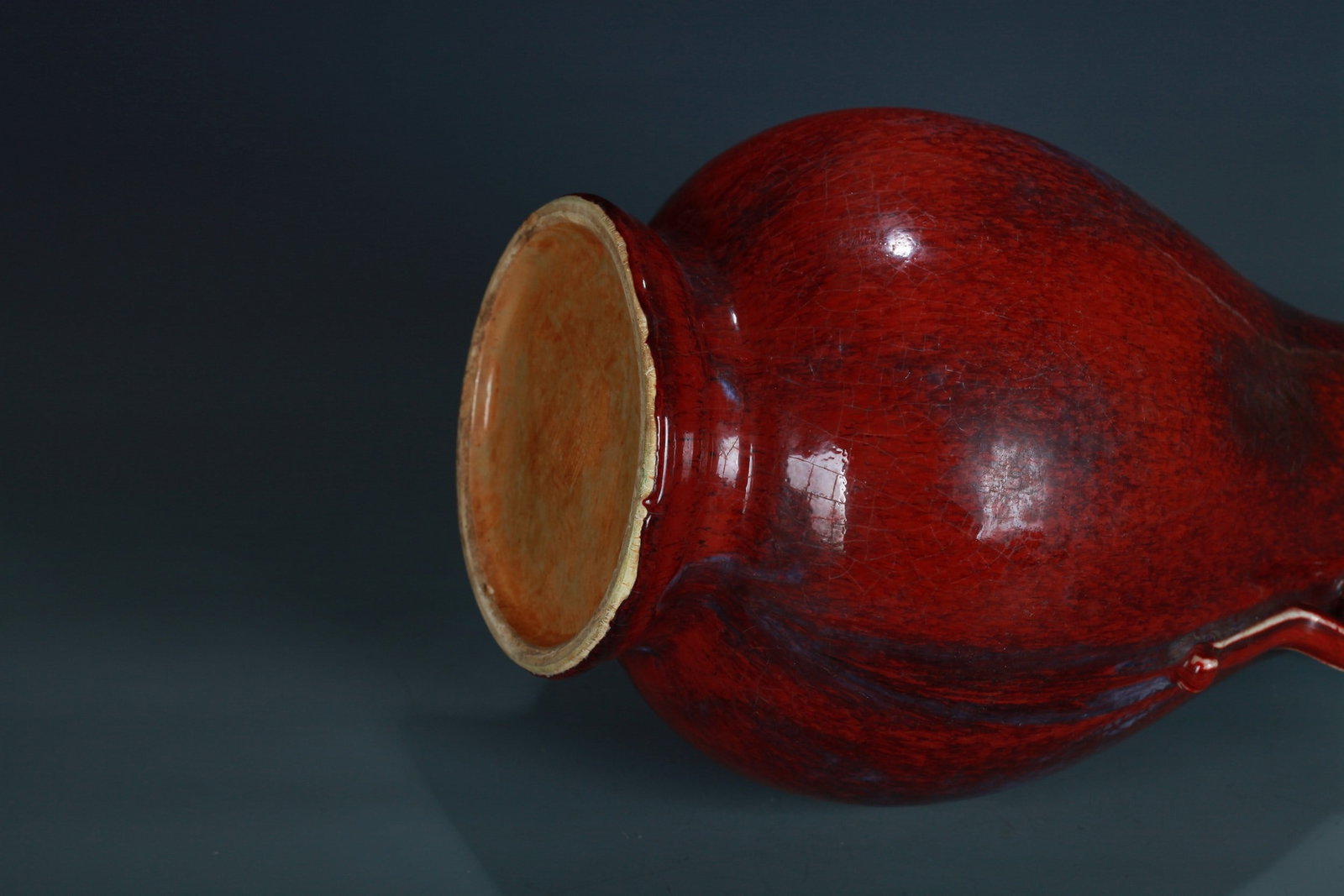 A RED GLAZED BOTTLE - 10