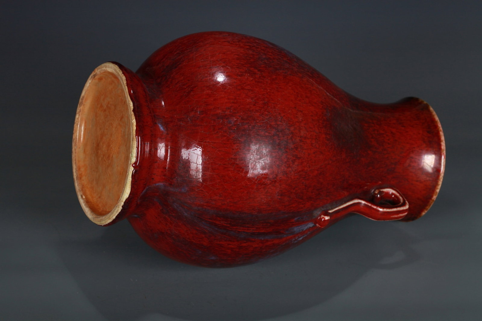 A RED GLAZED BOTTLE - 9