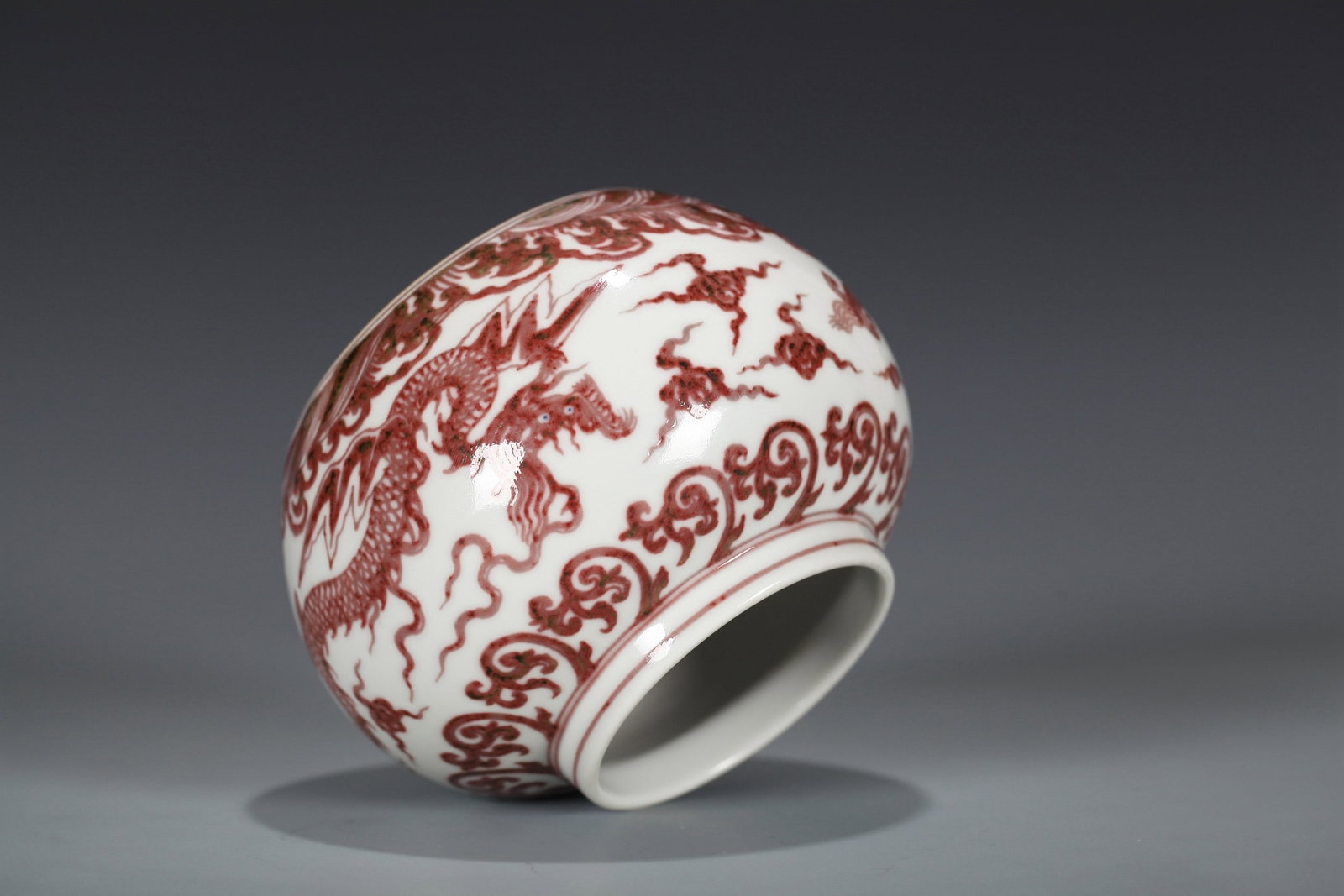A COPPER RED DRAGON PATTERNED SMALL JAR - 10