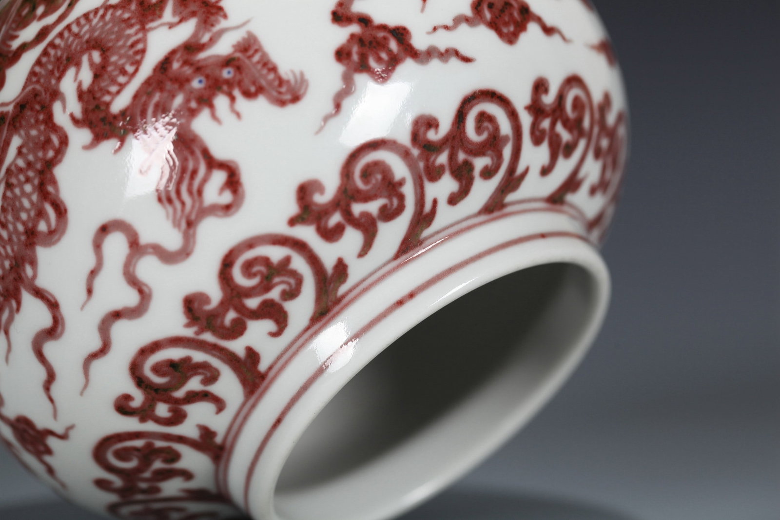 A COPPER RED DRAGON PATTERNED SMALL JAR - 11