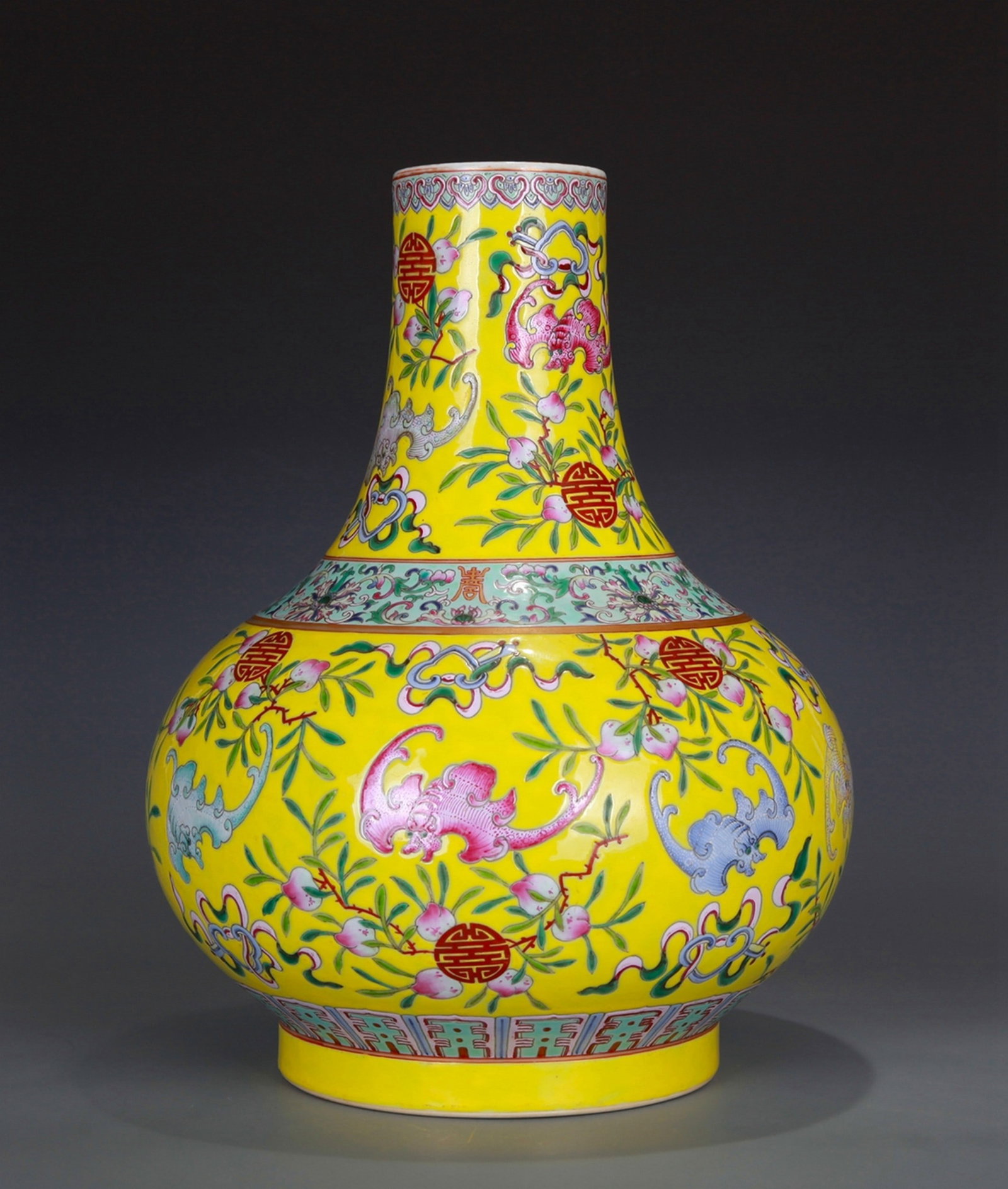 YELLOW FLORAL PATTERNED PORCELAIN VASE: 清 黃地粉彩福壽紋荸薺瓶 Yellow floral patterned porcelain vase Ht.32CM