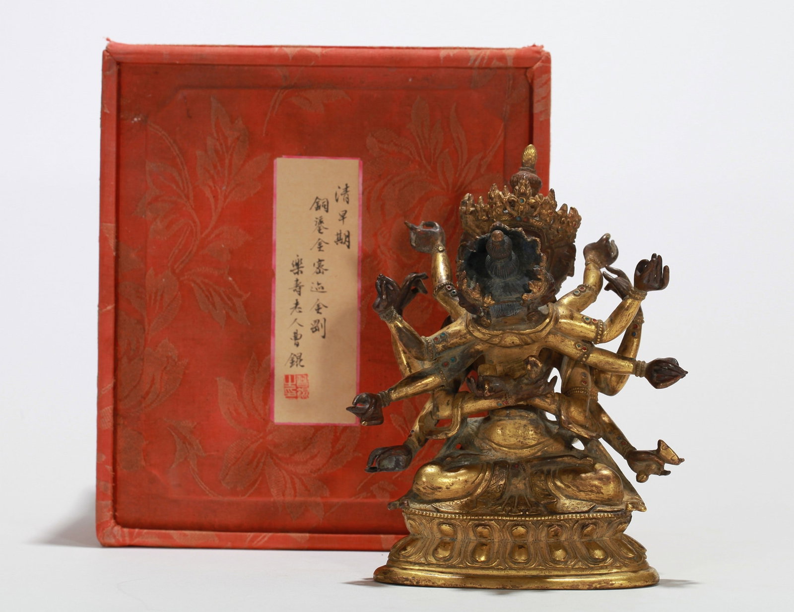 A GILT-BRONZE FIGURE OF BUDDHA: 清 铜鎏金密迹金刚佛像一尊 （附原盒） A Gilt-Bronze Figure of Buddha H16.5cm