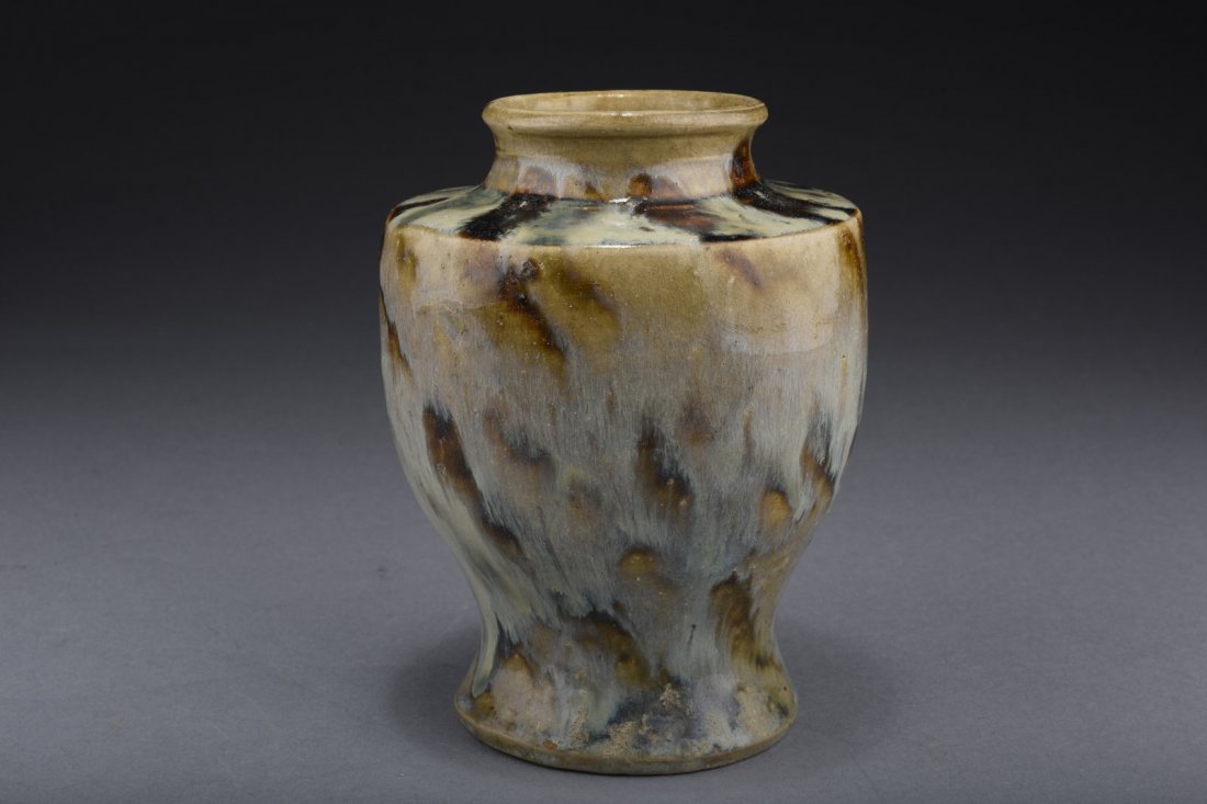 JUN WARE AMBER COLOR GLAZED VASE: The large Jun ware vase glazed in the style similar to natural amber colors, the body has wide shoulders that turns sharply downwards before the slightly splaying foot, bottom unglazed. H: 6 3/4 in (1