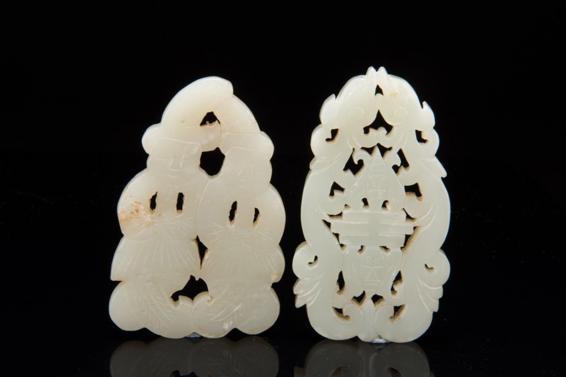 TWO CARVED JADE PENDANTS (1 of 8)