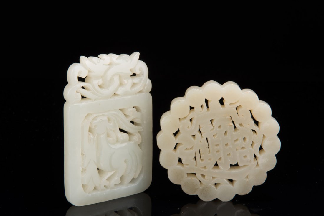 TWO CARVED JADE PENDANTS (1 of 7)