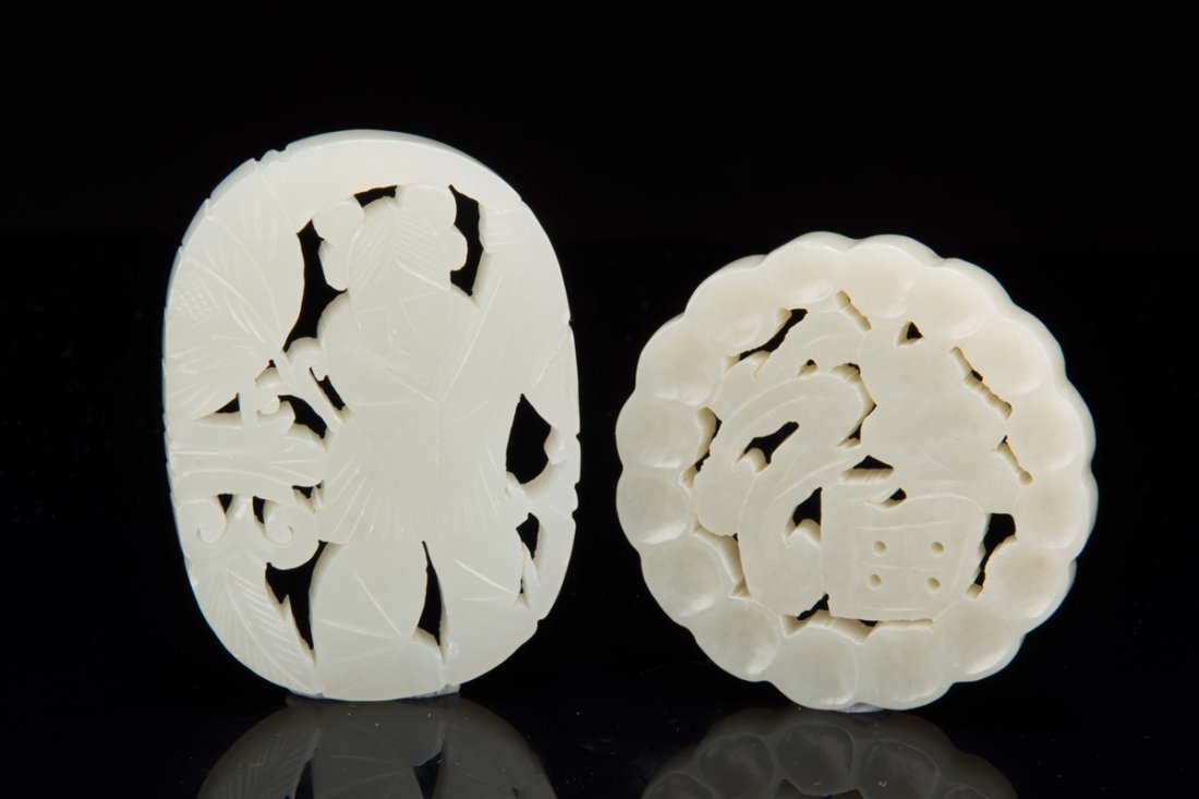 TWO CARVED JADE PENDANTS (1 of 10)