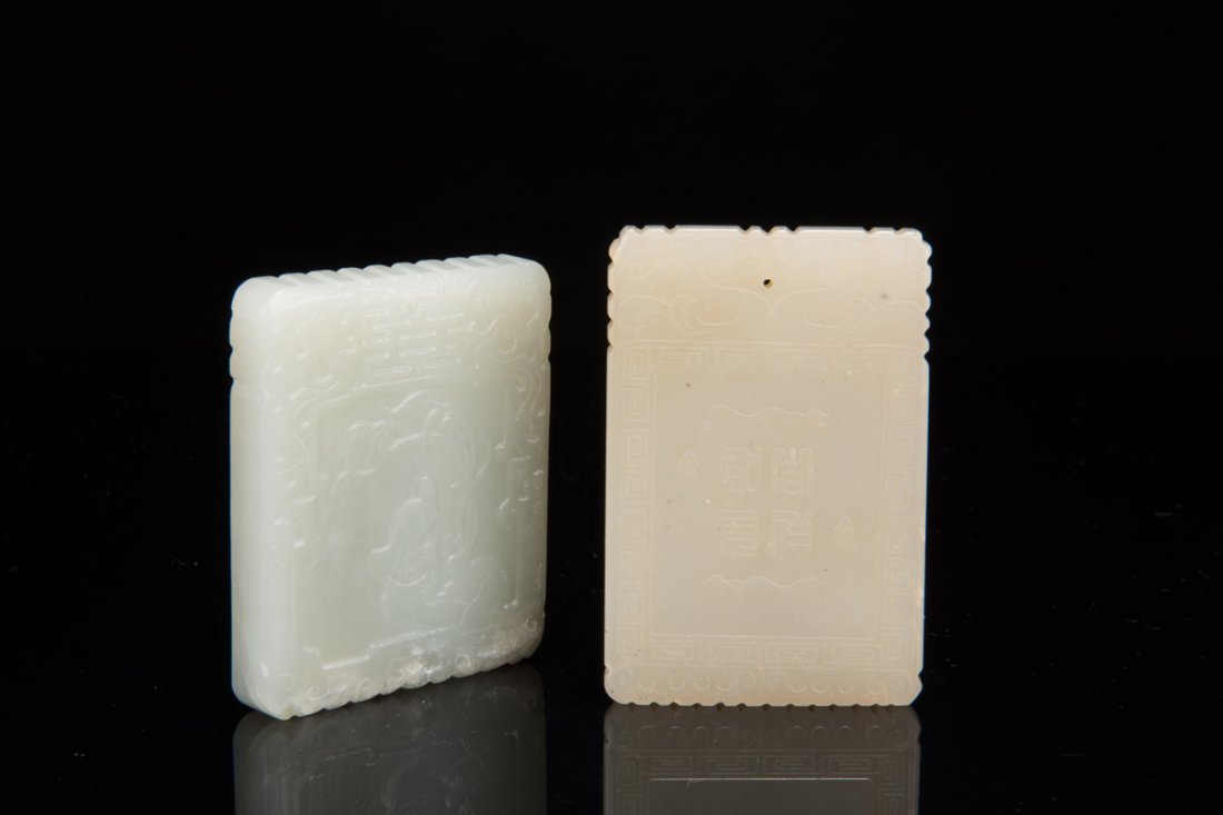 TWO CARVED JADE PENDANTS (1 of 10)