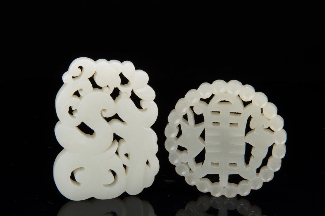 TWO CARVED JADE PENDANTS (1 of 9)