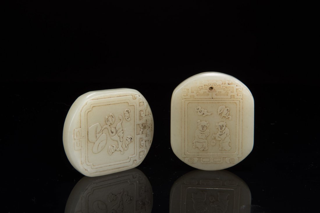 TWO CARVED JADE PENDANTS (1 of 10)