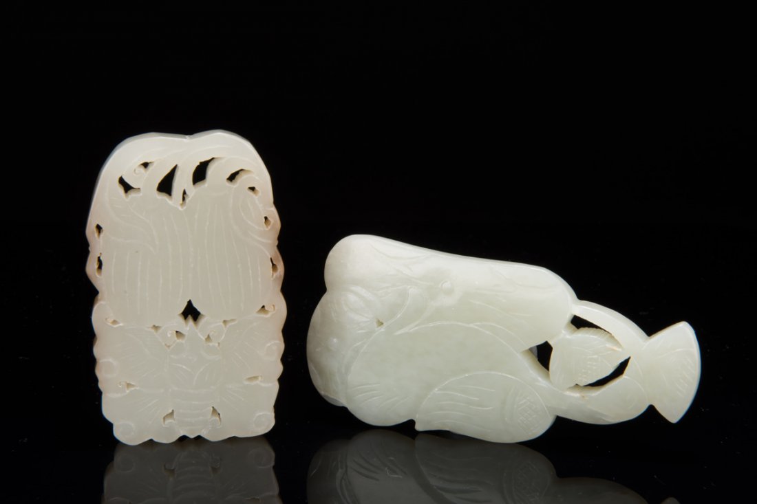 TWO CARVED JADE PENDANTS (1 of 9)