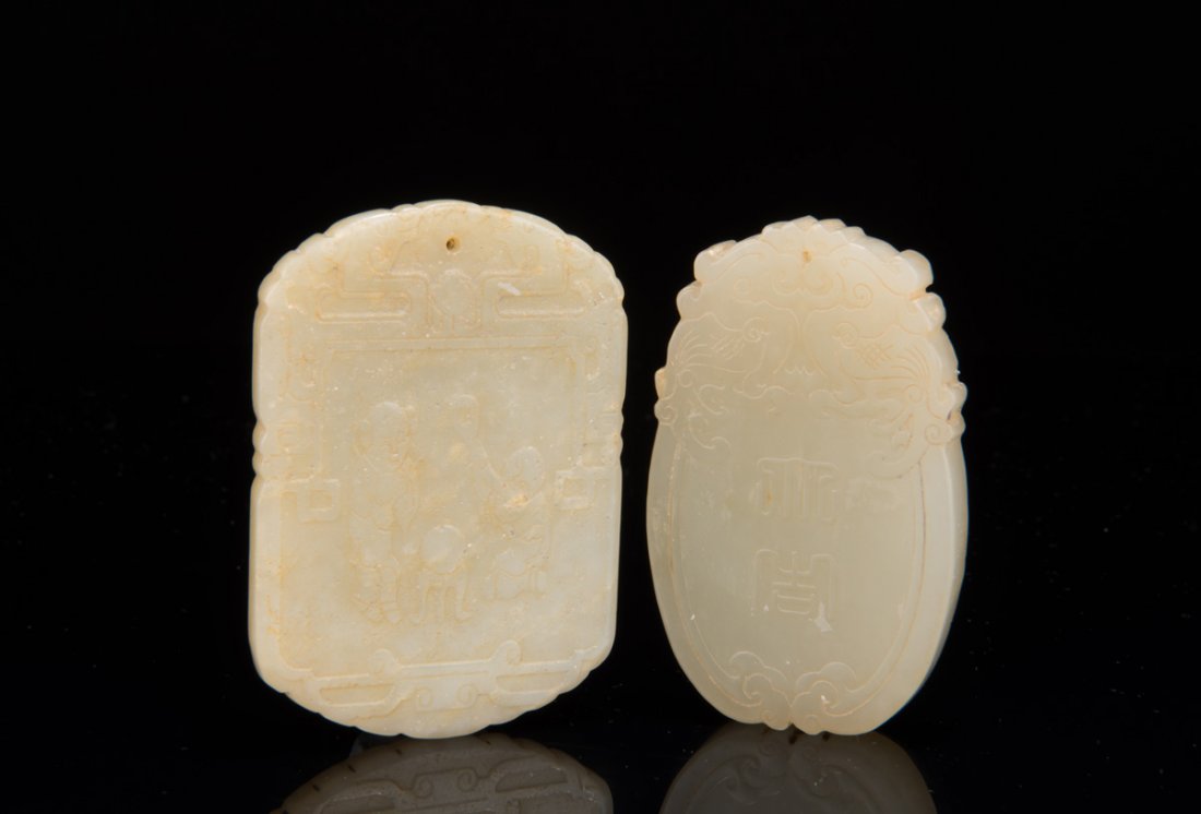 TWO CARVED JADE PENDANTS (1 of 10)