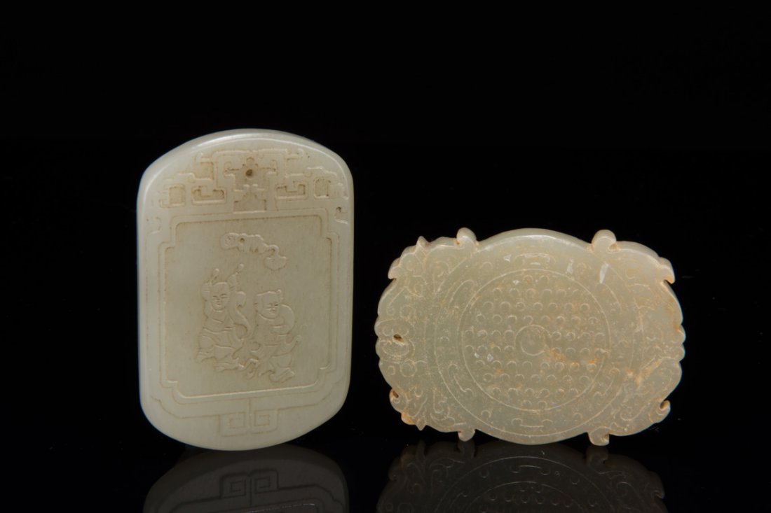 TWO CARVED JADE PENDANTS (1 of 10)