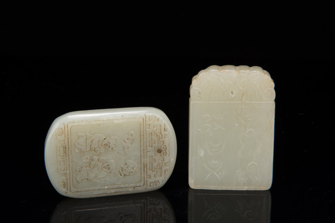 TWO CARVED JADE PENDANTS (1 of 10)