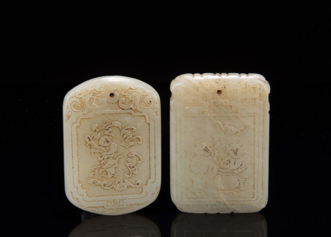 TWO CARVED JADE PENDANTS (1 of 10)
