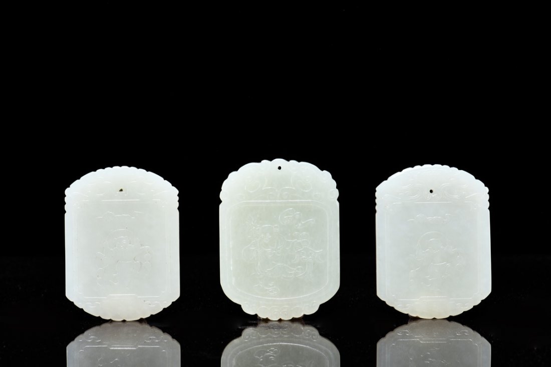 THREE JADE CARVED SMALL PLAQUES, PAI (1 of 4)