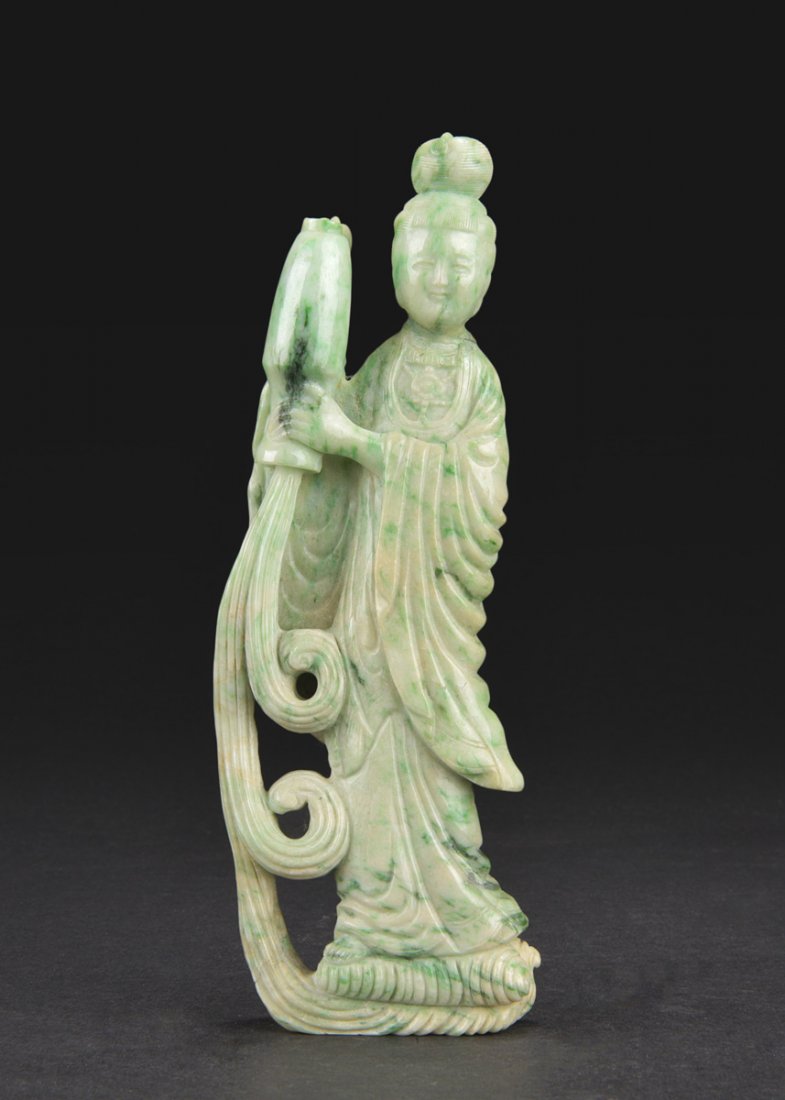 A JADEITE CARVING OF GUANYIN (1 of 8)