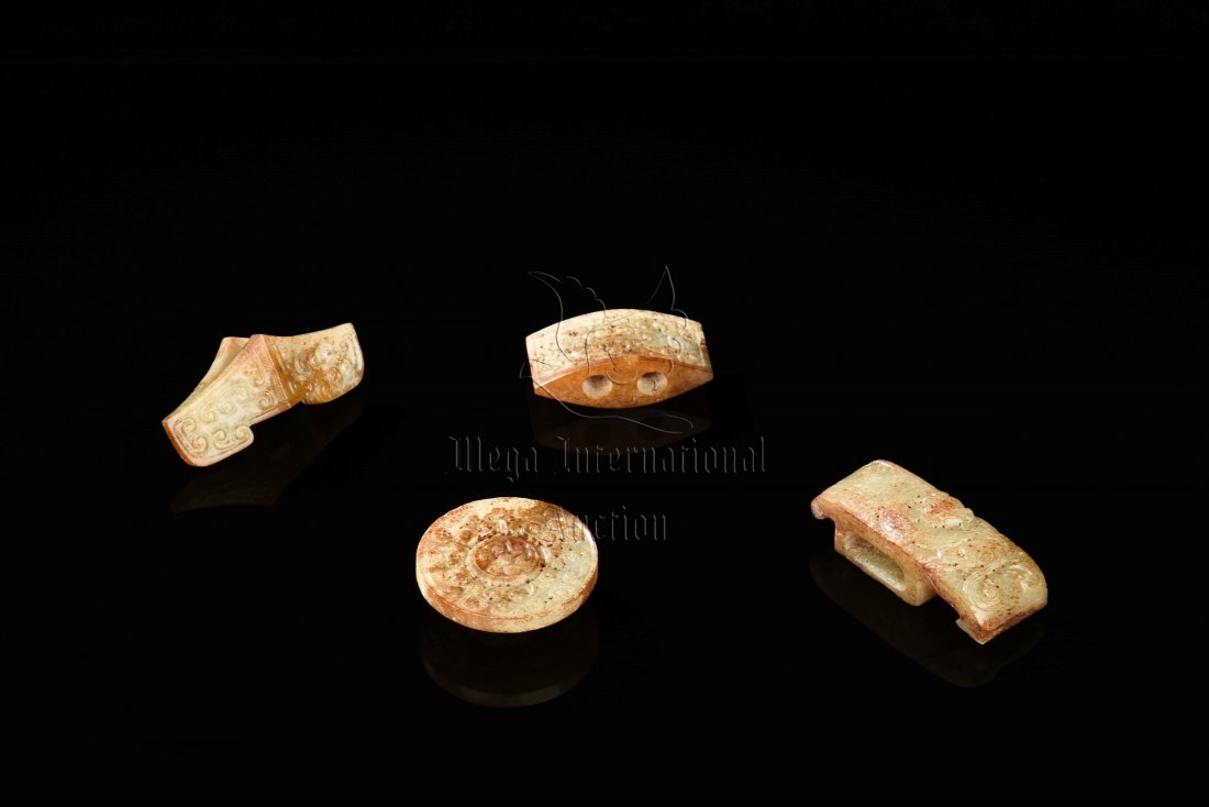 SET OF FOUR JADE CARVED SWORD ORNAMENTS (1 of 10)