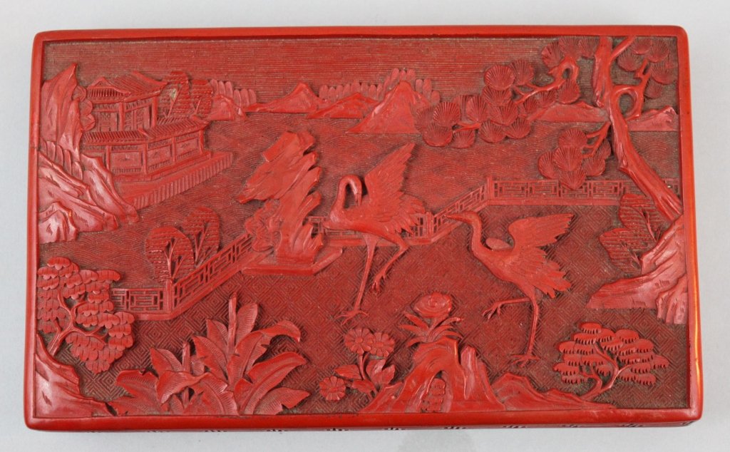 Late Qing Dynasty Chinese Carved Cinnabar Box: Late Qing Dynasty Chinese Carved Cinnabar Box. The lid decorated with cranes in an extensive landscape opening to a single lacquered compartment. Brass or copper. Late 19th or early 20th Century. 9" w
