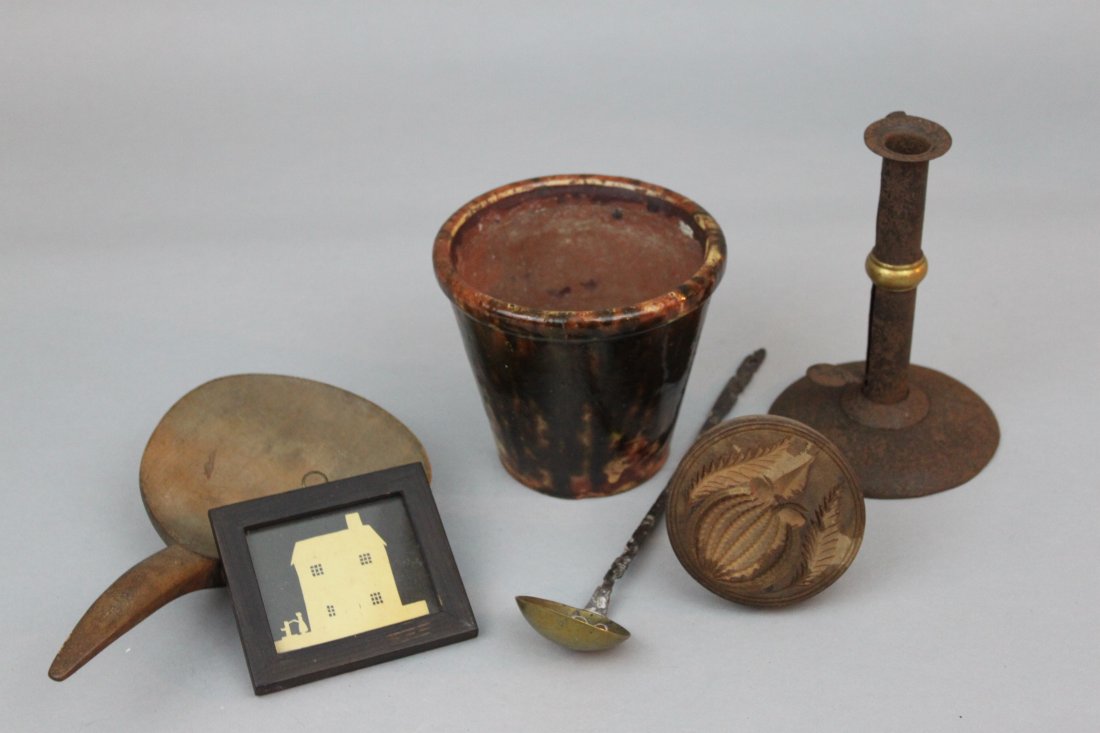 Group Lot of Assorted Country Americana: Group Lot of Assorted Country Americana, comprising a Pennsylvania Glazed Redware Flower Pot, a Carved Wooden Butterprint, a Wooden Butter Paddle, a WroughtIron and Brass Tasting Ladle, a Reproduction