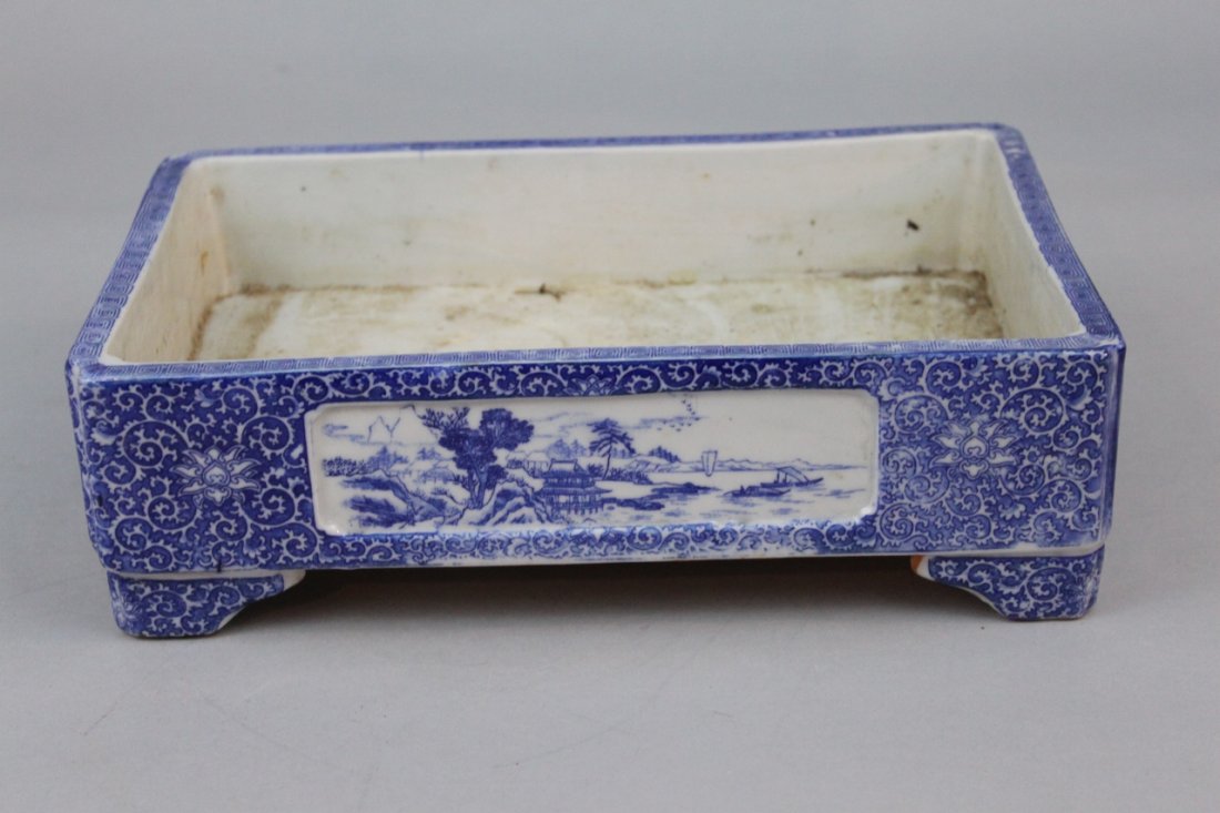 Chinese Blue & White Porcelain Planter, Early-Mid 20thC: Chinese Blue & White Porcelain Planter, Early-Mid 20thC, of rectangular form on four scroll feet, decoration appears to be mostly transfer printed. 13" long.