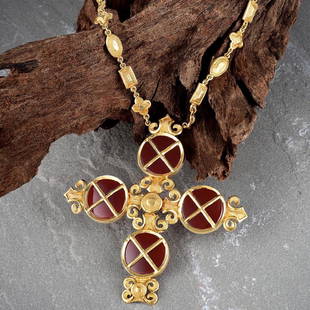 Ilias Lalaounis Gold Cross Necklace: Featuring an 18K yellow gold cross, enhanced byÂ four carnelian discs, with a textured gold quatrefoil, oval, and rectangular shaped link necklace; chain length 15-1/2 inches; pendant measures 3-1/2