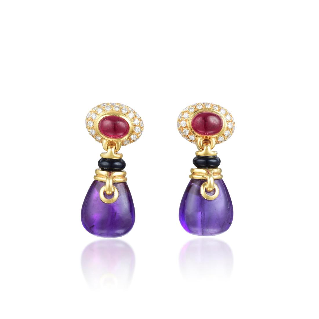Bulgari Amethyst Onyx Diamond and Ruby Drop Earrings: Crafted out of 18K yellow gold, featuring amethyst drops with onyx rondelles, ruby cabochons and round-cut diamond earrings, total diamond weight is approximately 0.80 carats, total ruby weight is app