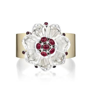 Rock Crystal Cuff & Brooch,Attributed Suzanne Belperron: Rock Crystal Convertible Cuff and Brooch, Attributed to Suzanne BelperronA rock crystal flower brooch, circa 1935, set in platinum, displaying cabochon rubies weighing a total of approximately 5.90 ca