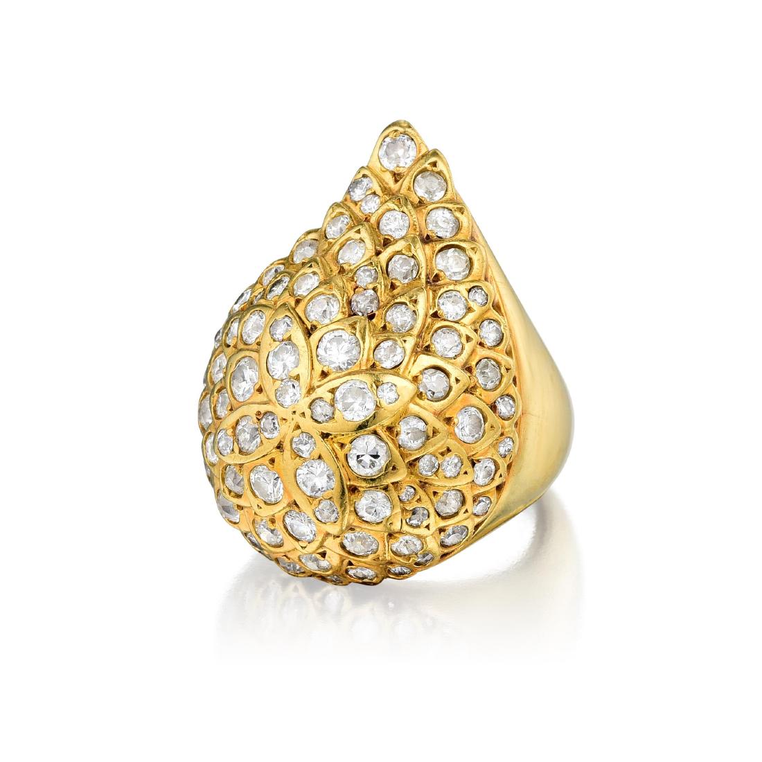 A Modified Gold and Diamond Ring: Originally from an earclip design by Suzanne Belperron, an 18K gold diamond ring set with old European, transitional, and single-cut diamonds weighing a total of approximately 1.75 carats, with H-I co