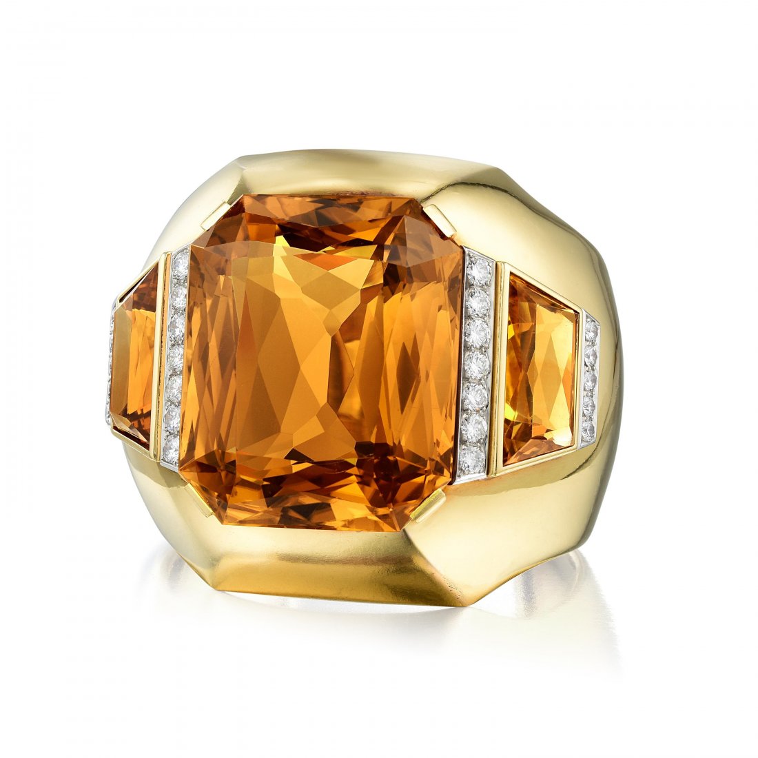 Citrine & Diamond Cuff, Attributed to Suzanne Belperron: A Citrine and Diamond Gold Cuff, Attributed to Suzanne Belperron A bold 18K gold cuff, circa 1945, featuring a magnificent cut-cornered modified rectangular brilliant-cut citrine weighing approximatel