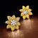 A Pair of Fancy Yellow Diamond Earclips