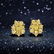 A Pair of Fancy Yellow and Pink Diamond Earclips